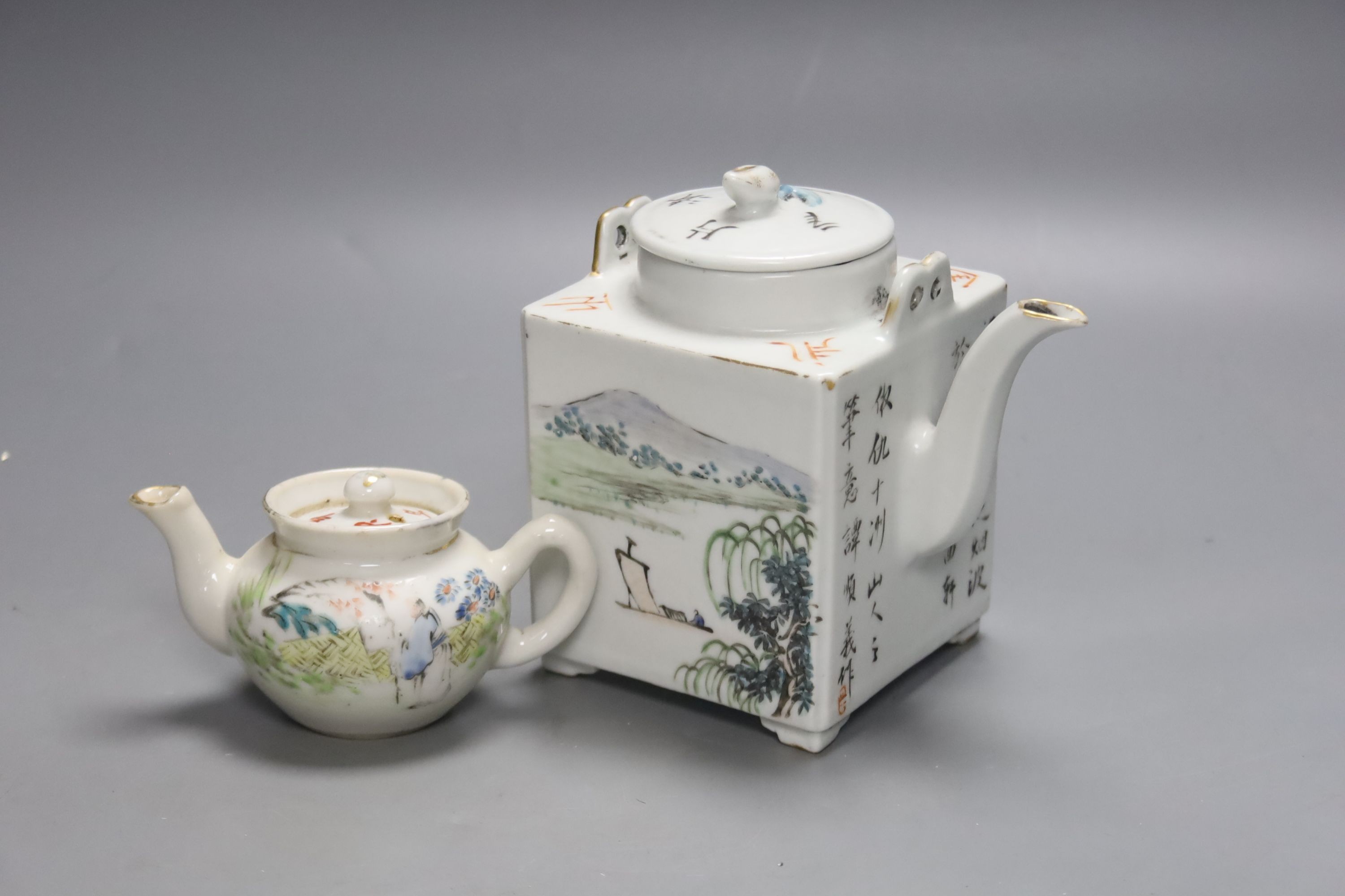 A Chinese enamelled porcelain square teapot and cover and a similar miniature teapot and cover, tallest 13cm